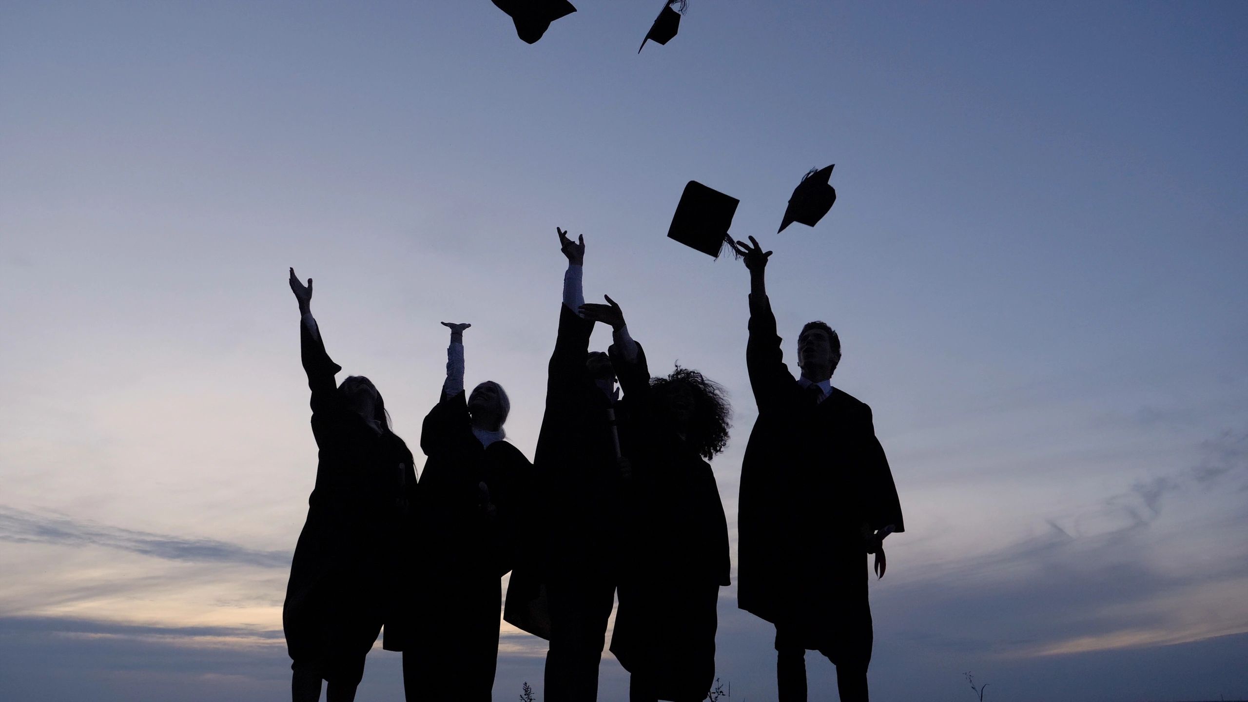 Diverse international students celebrating graduation