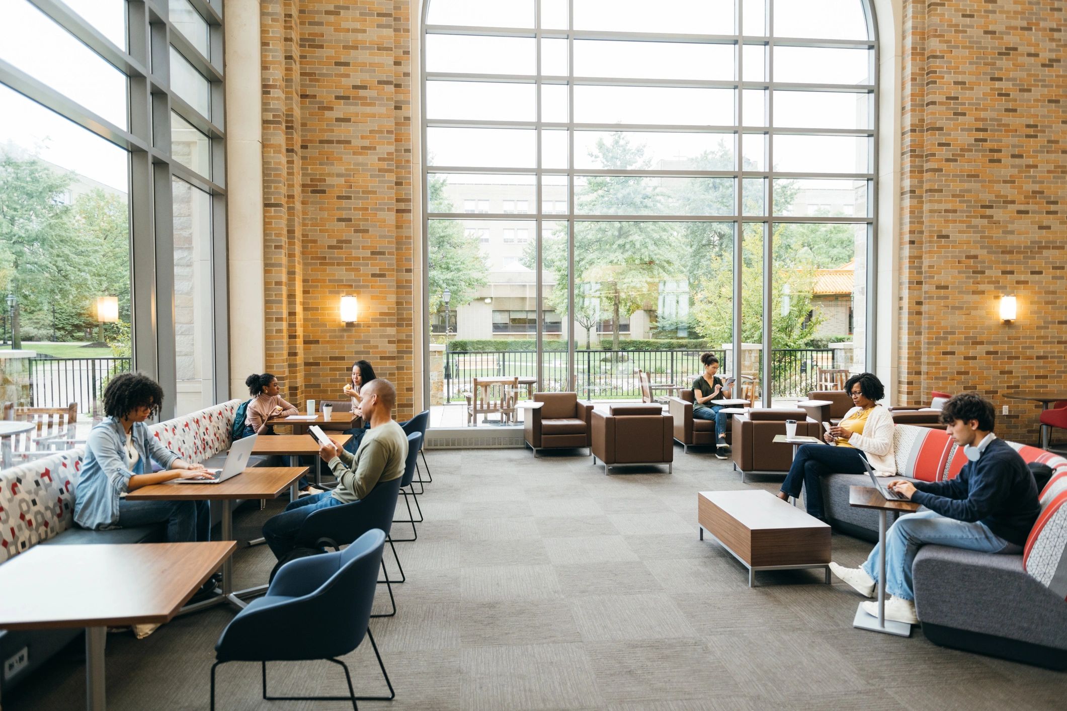 Graduate students collaborating in a campus study space
