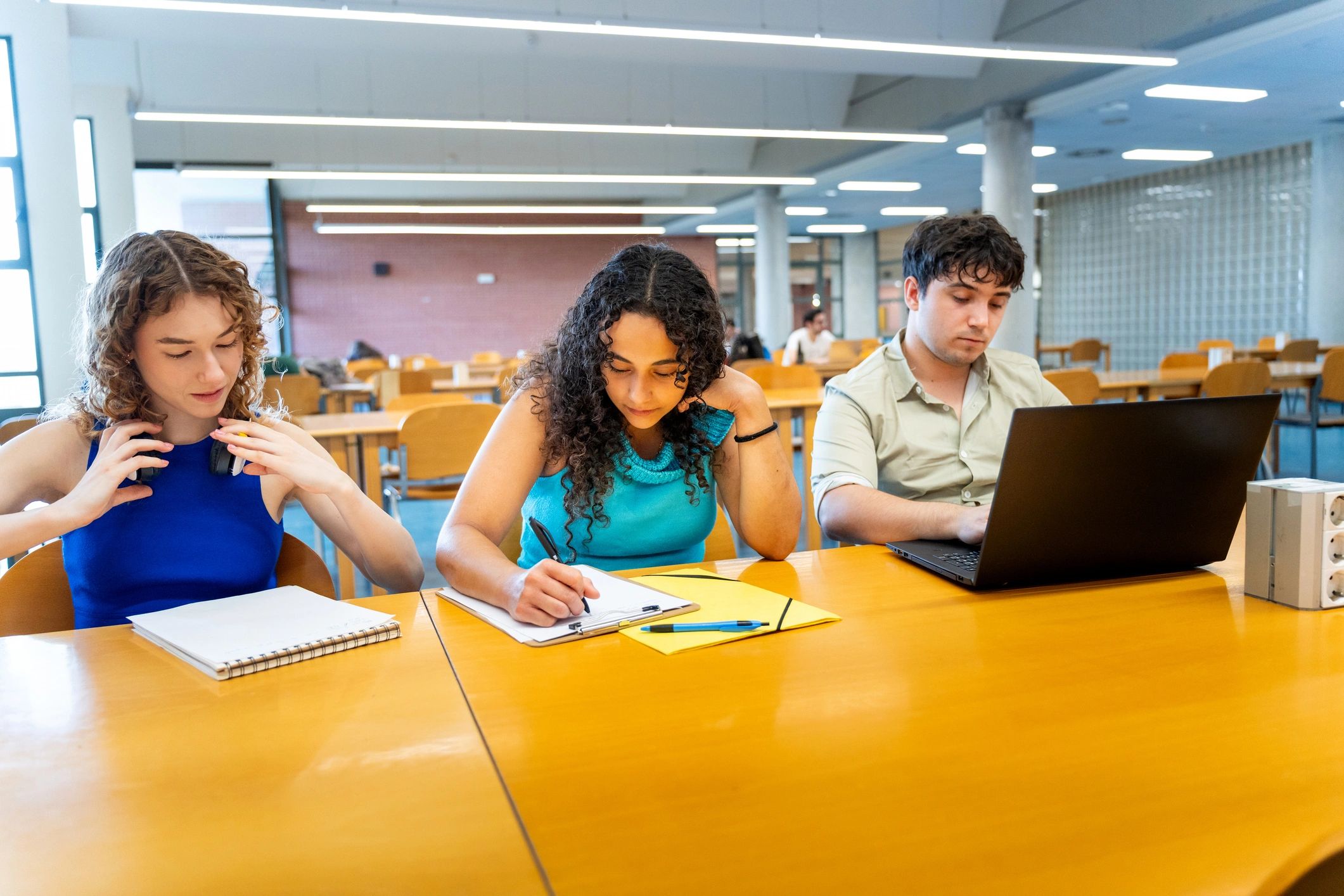 Graduate students studying in a university library