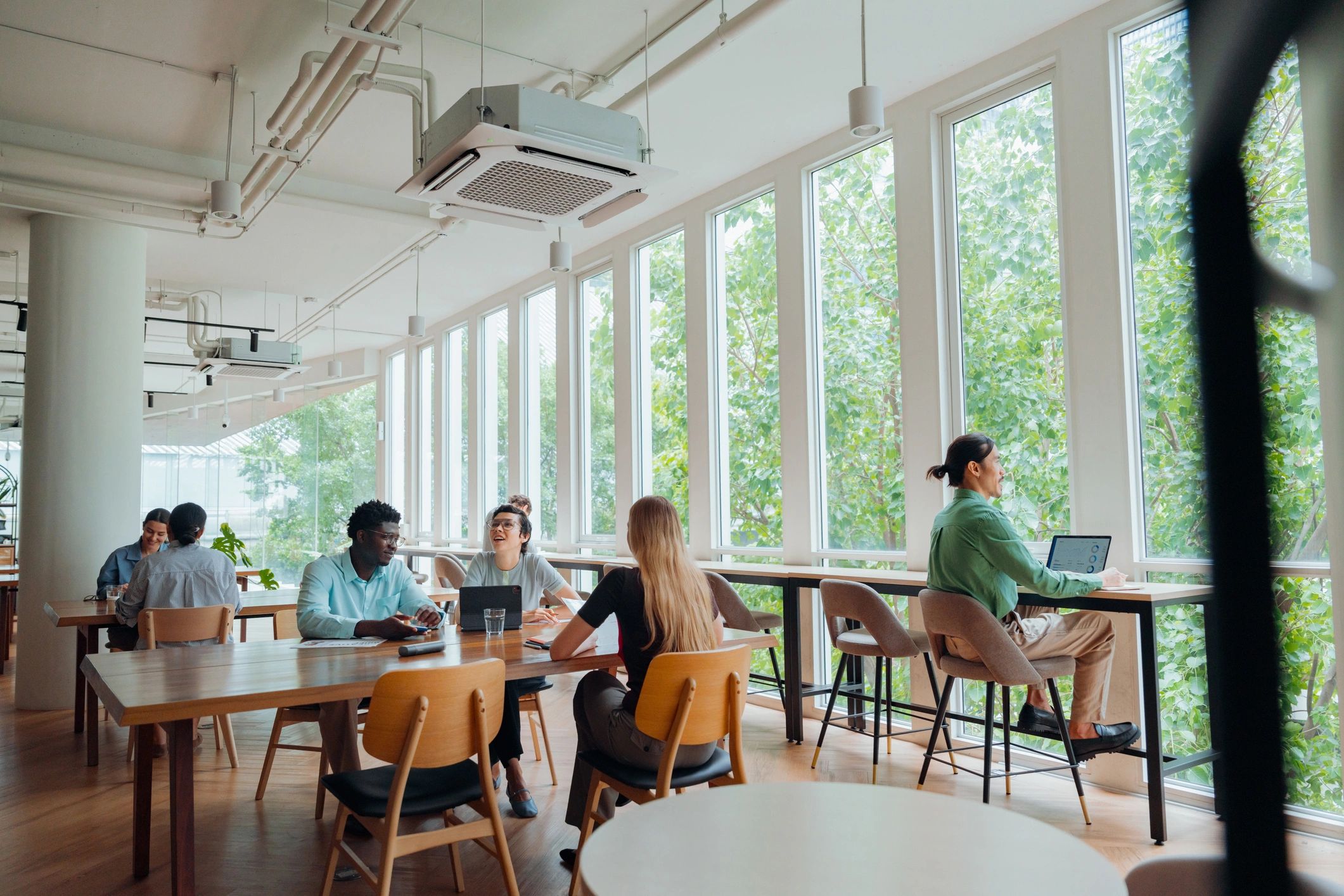 Professionals collaborating in a modern research workspace